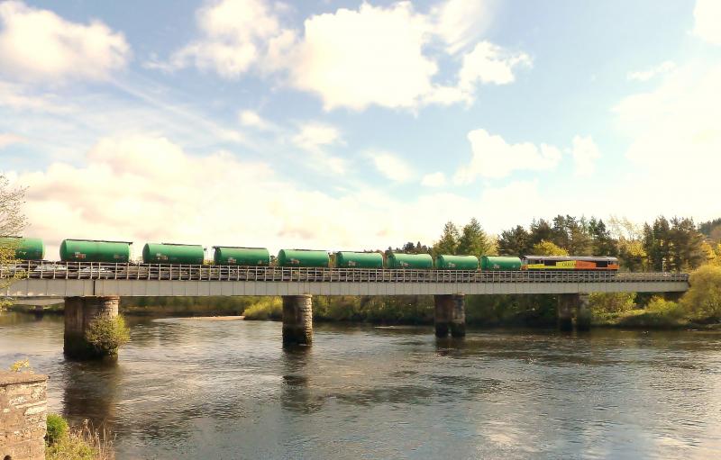 Photo of Colas Rail Freight 66847 crossing the River Tay Viaduct at Perth with the 6Z47 Grangemouth to Linkswood tanks on 9th. May 2012