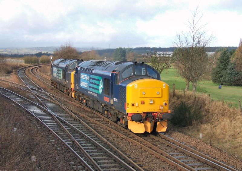 Photo of 37419 & 688 pass Carmuirs East with 0Z99 Perth - Grangemouth.