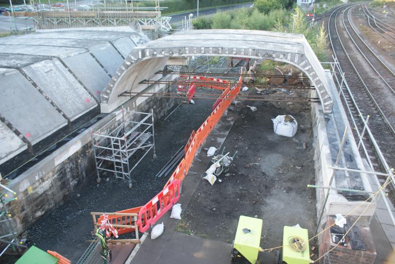 Photo of Three Con-arch sections of Span 4 of Shore Road bridge are now in place