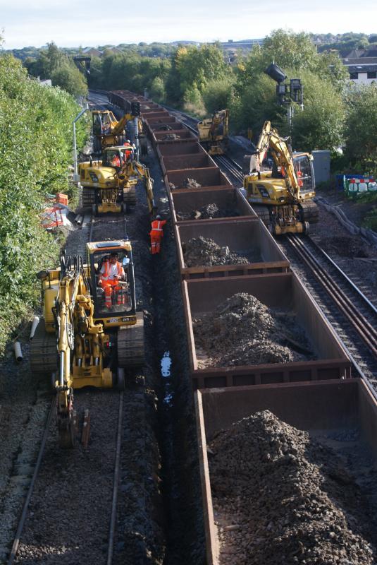 Photo of A hive of activity south of Kerse Road as new drainage gets installed on either side and the length of the train. 