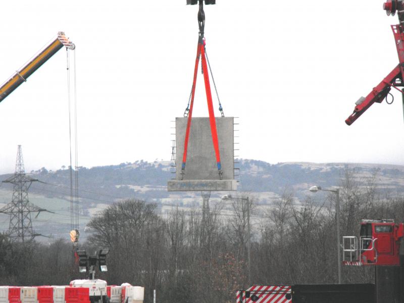 Photo of L shape concrete block in mid air