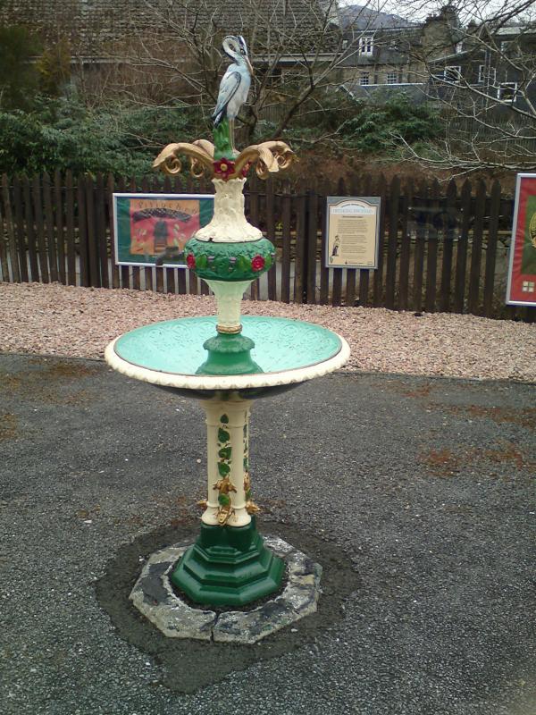 Photo of Heron drinking fountain at Pitlochry.