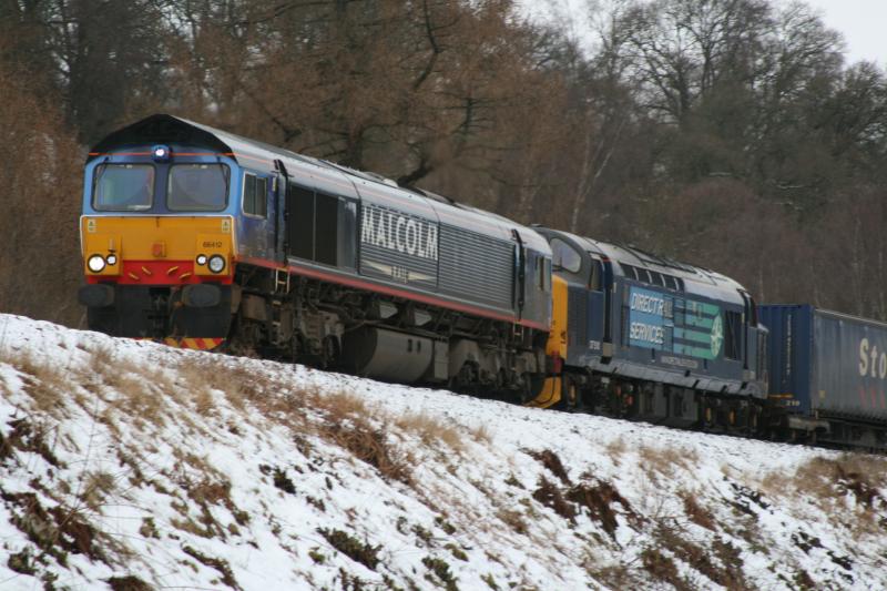 Photo of 66412 and 37510 passing Dunkeld on time Friday 13th Feb 09