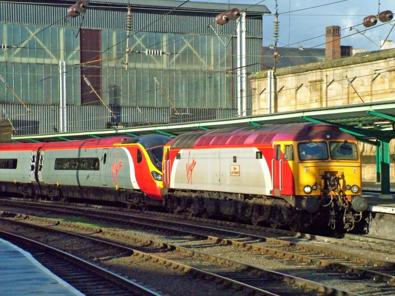 Photo of 57301 hauling 390014 At Carlisle