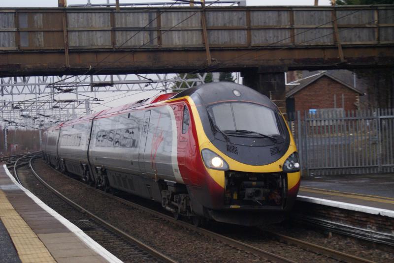 Photo of virgin pendolino passing motherwell