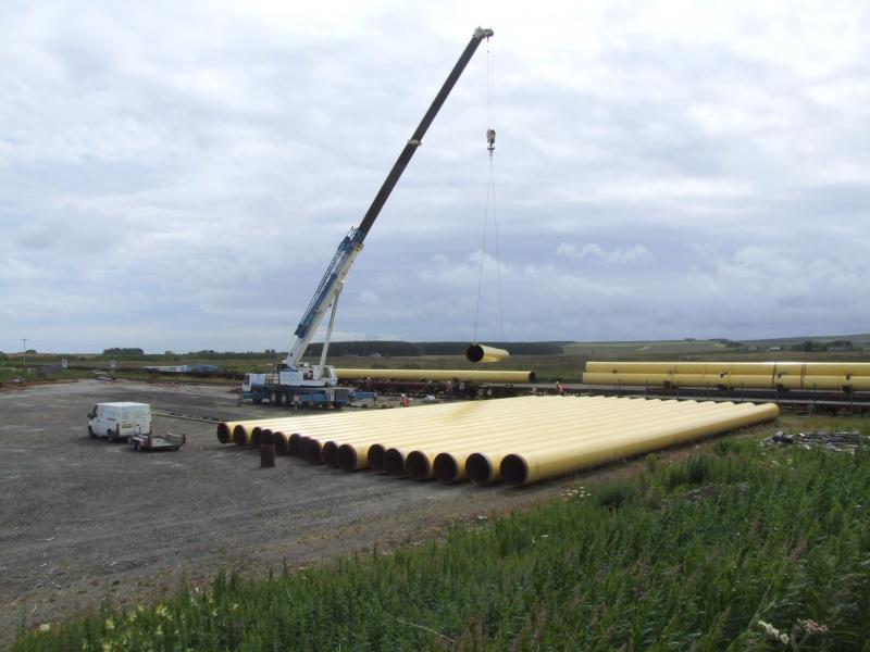 Photo of Unloading the Georgemas Pipes (Slight Return)