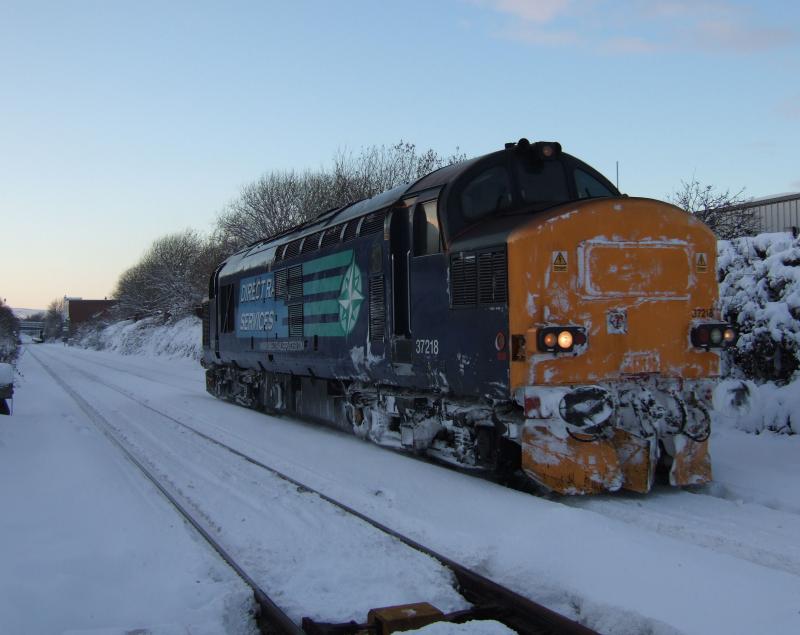 Photo of 37218 passes Grangemouth Jn, after snowplough duties.