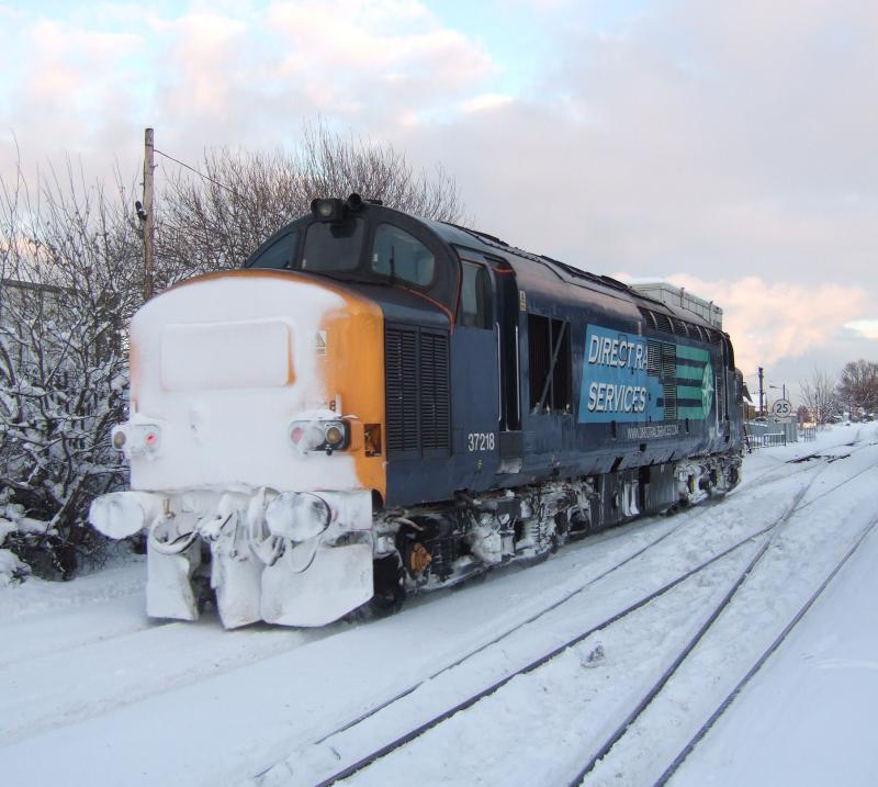 Photo of 37218 passes Grangemouth Jn. after snowplough duties.