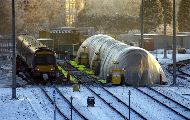 Photo of Class 170 Wrapped in Plastic