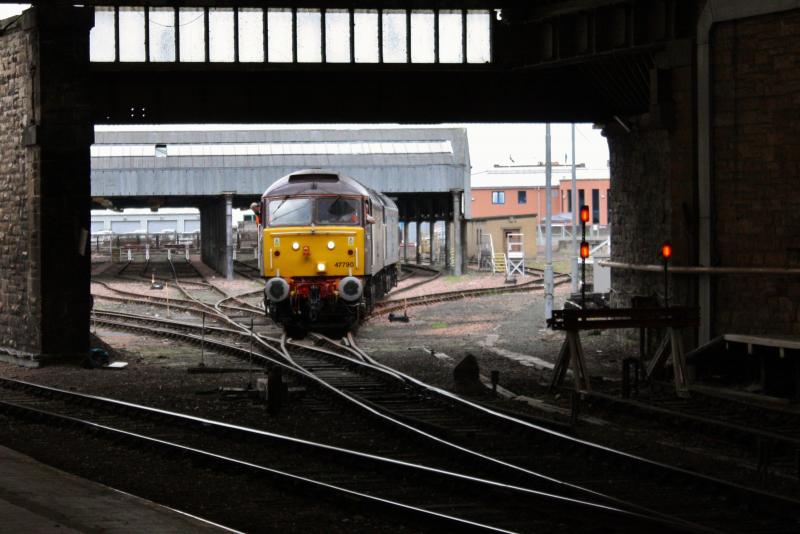 Photo of 47790 pushes failed 47818 into the carriage shed